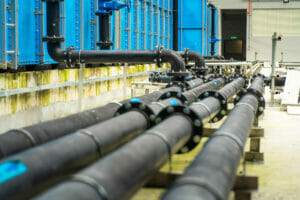 An intricate network of city water pipes, showcasing the complex infrastructure responsible for delivering water to homes and businesses.