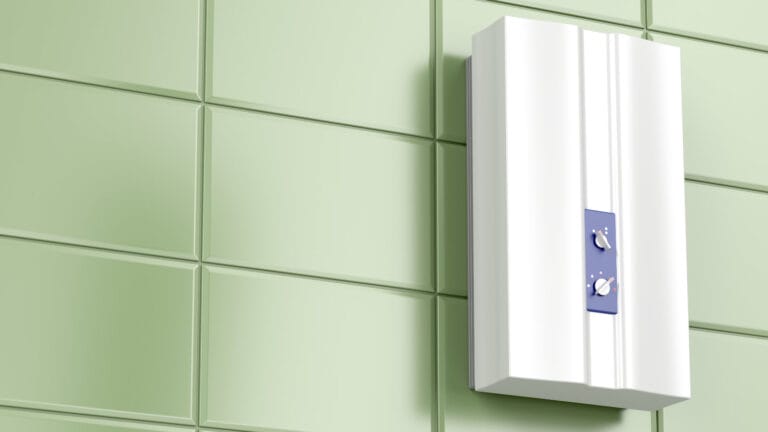 Modern tankless water heater mounted on a light green tiled wall, with control knobs for temperature adjustment, representing maintenance for efficient home hot water supply.